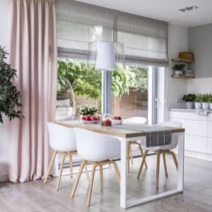 Roman shades are beautiful and useful in a contemporary kitchen.